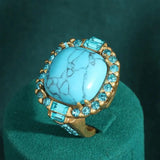 Kultainen turkoosi kivi zirkonirenka
