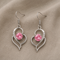 Kiiltävät sydänkorvakorut